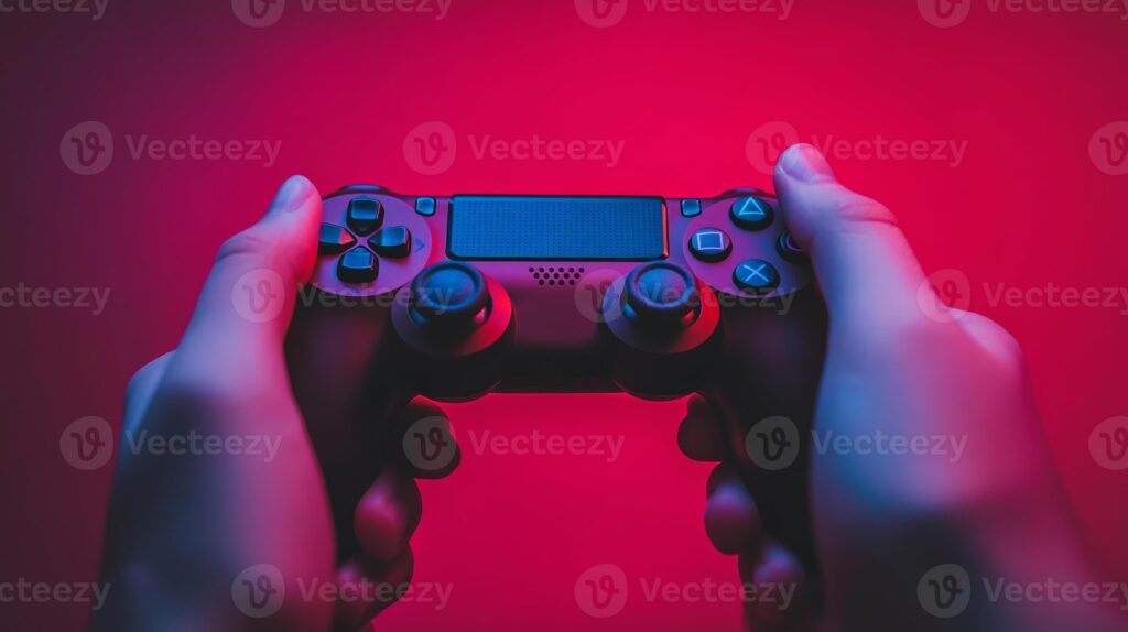 a person holding a modern gaming controller in a colorful room with vibrant red and blue lighting at night photo